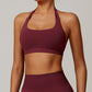 Seamless halter and backless sports bra