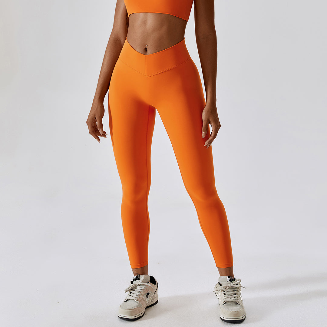 Cross-hip lift at waist Sports leggings