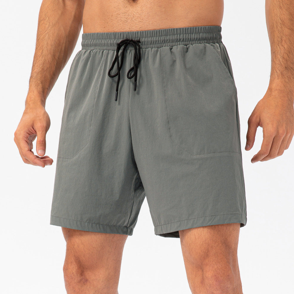 Short de sport ample avec cordon de serrage pour hommes