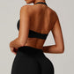 Seamless halter and backless sports bra