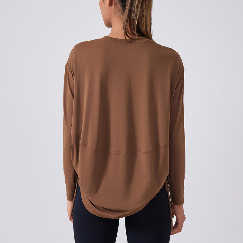 Nude and breathable long sleeve loose sports top