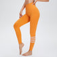 Leggings de yoga de sport rayés au mollet taille haute