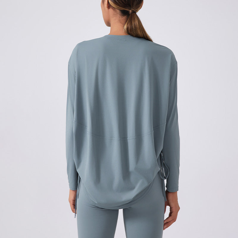 Nude and breathable long sleeve loose sports top