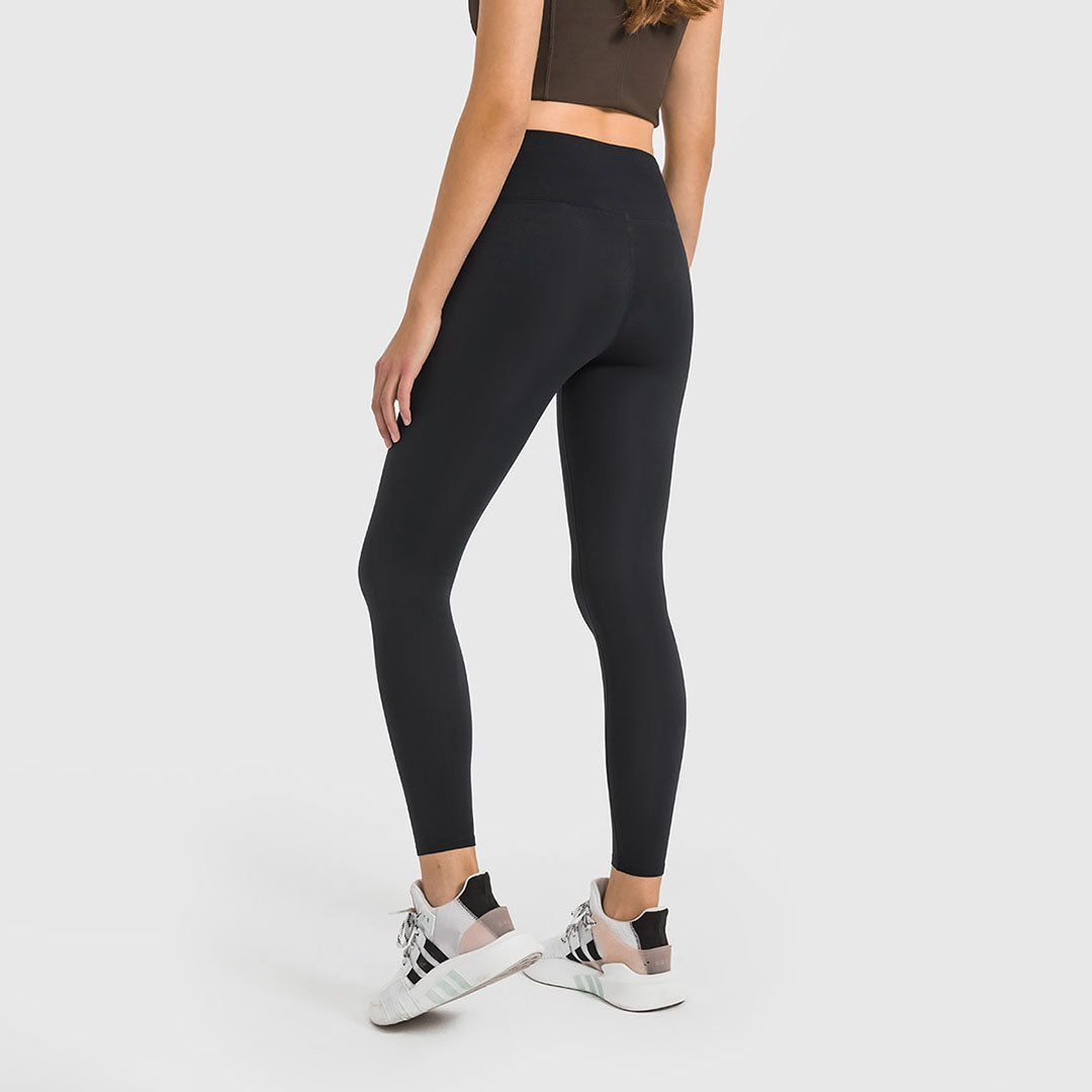 Legging de yoga extensible brossé de couleur unie