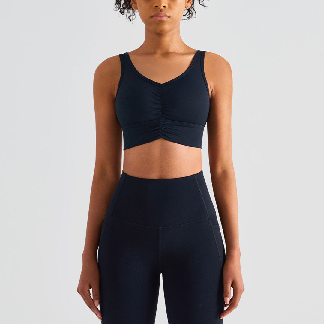Solid color pleated sports bra