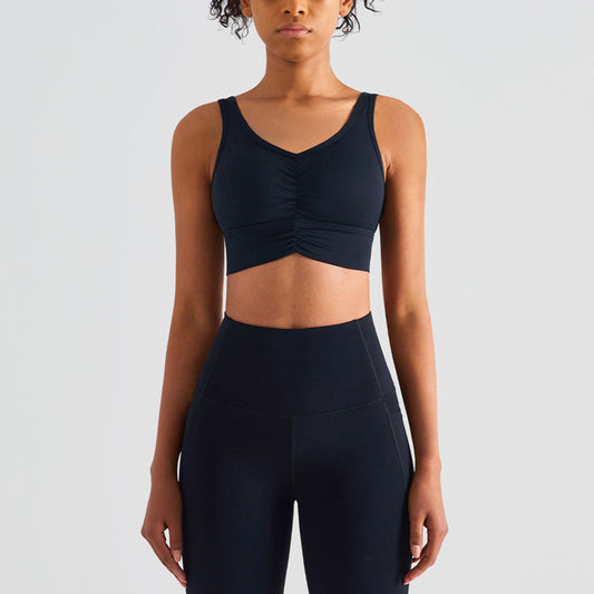 Soutien-gorge de sport plissé de couleur unie