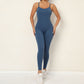 Solid color cross back sports jumpsuit