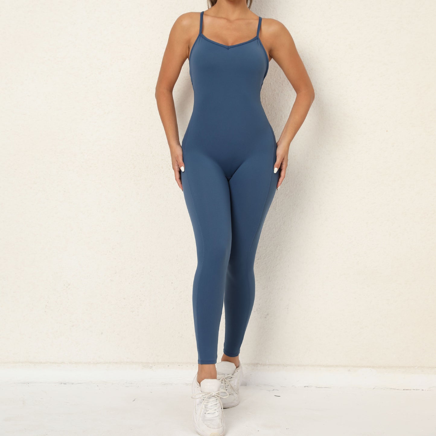 Solid color cross back sports jumpsuit