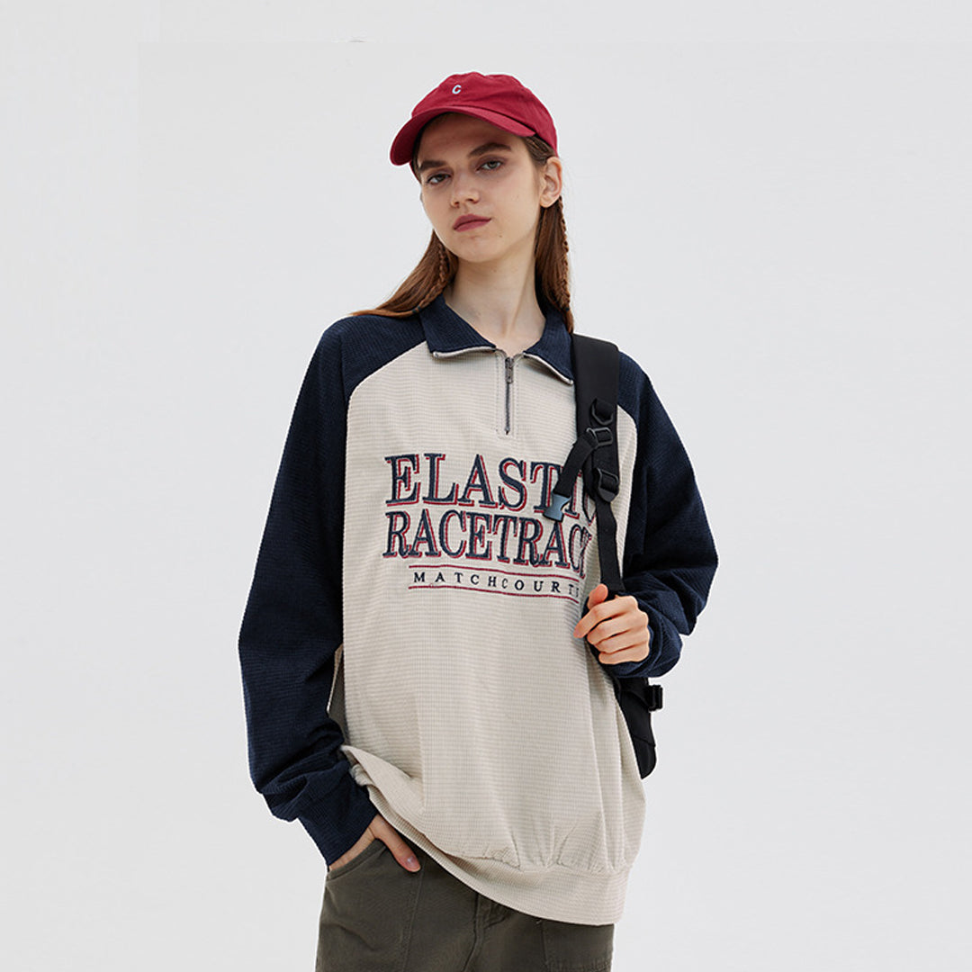 Contrasting panels lettered printed sweatshirt