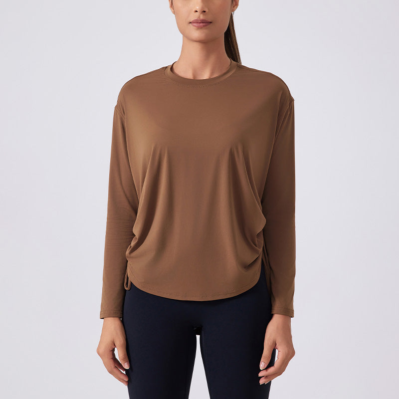 Nude and breathable long sleeve loose sports top