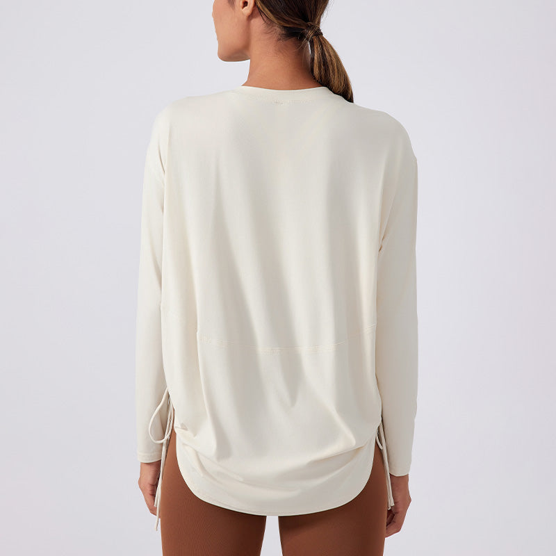 Nude and breathable long sleeve loose sports top