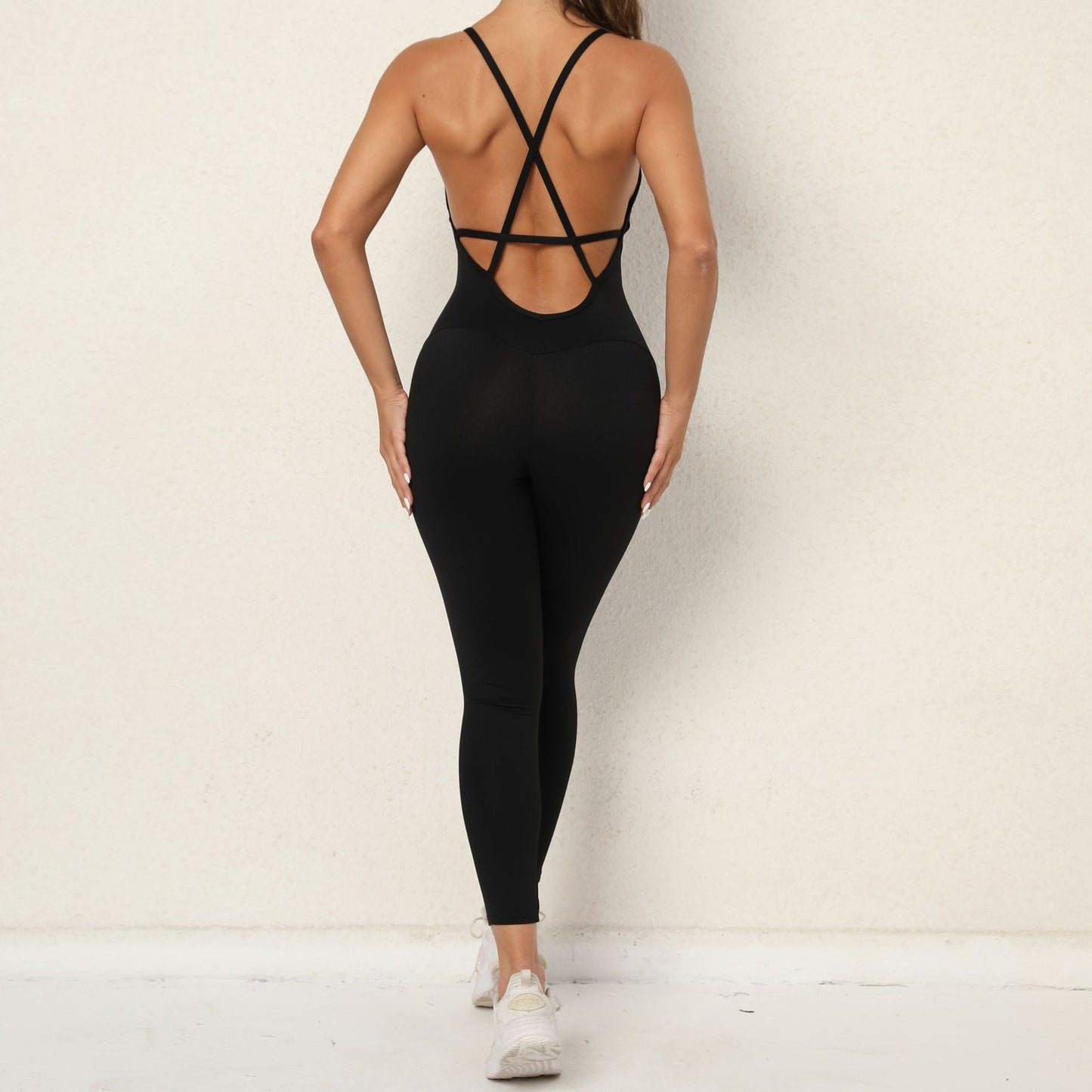 Solid color cross back sports jumpsuit