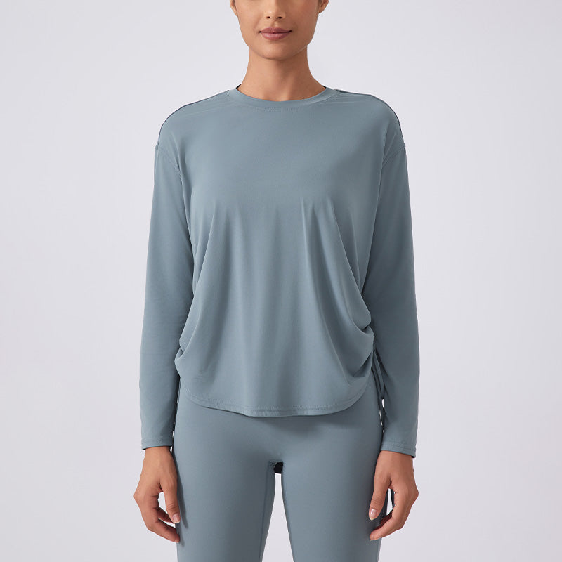 Nude and breathable long sleeve loose sports top