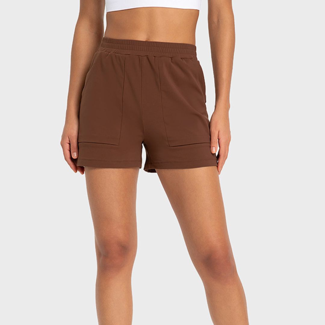 Side pockets stretch loose sports shorts