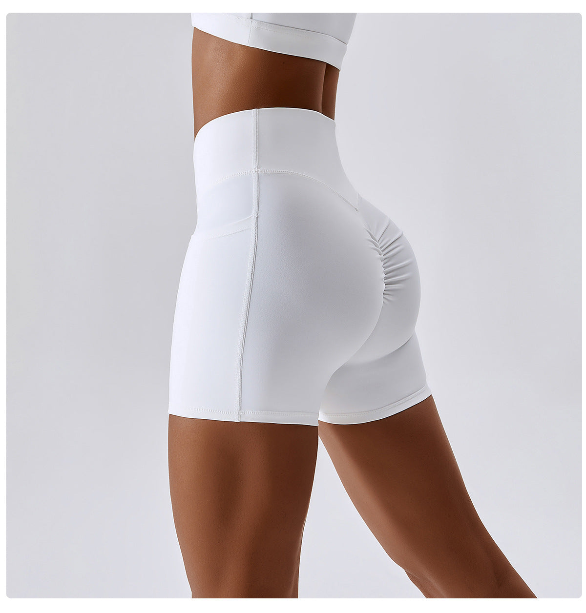 Solid color crossover waist pocket sports shorts