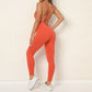 Solid color cross back sports jumpsuit