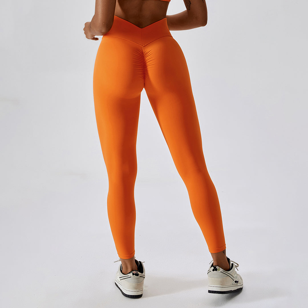 Cross-hip lift at waist Sports leggings