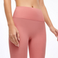 High-waisted nude fitness trousers