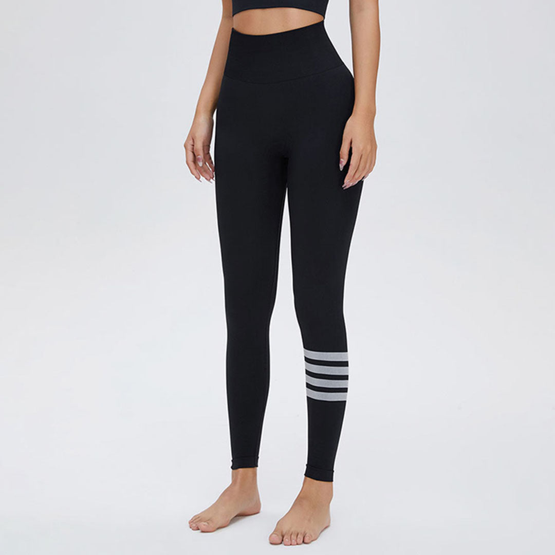 Leggings de yoga de sport rayés au mollet taille haute