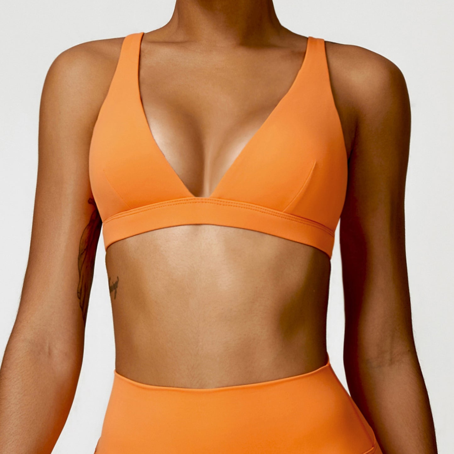 Triangle chest cup double strap sports bra