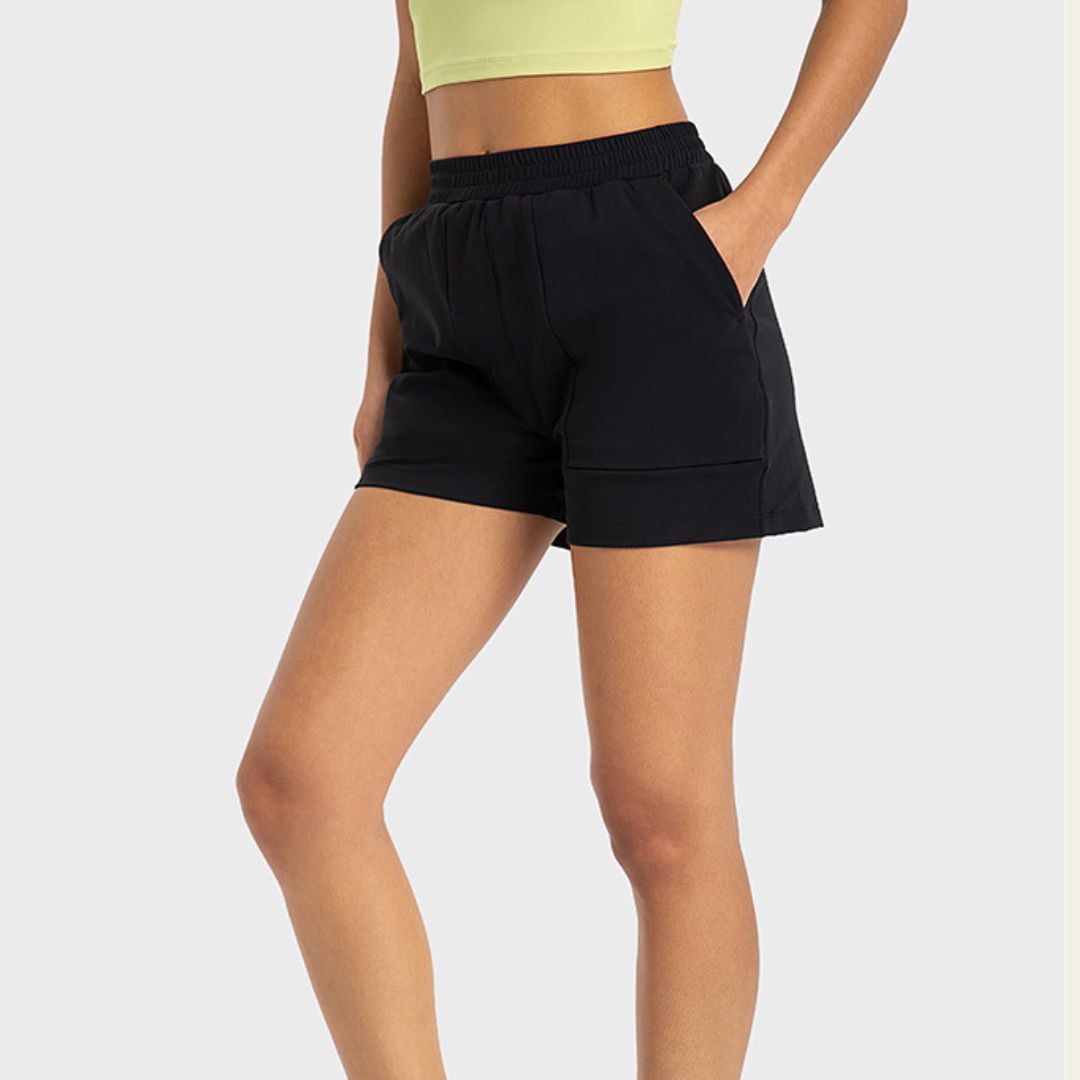 Side pockets stretch loose sports shorts