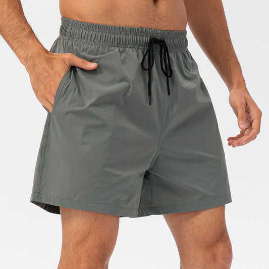 Short de sport ample avec cordon de serrage pour hommes