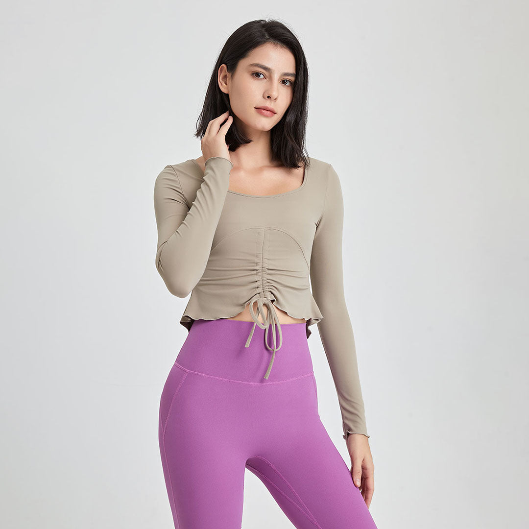 Ruffles with irregular bottom Long-sleeved sports top