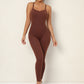 Solid color cross back sports jumpsuit