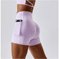 Solid color crossover waist pocket sports shorts