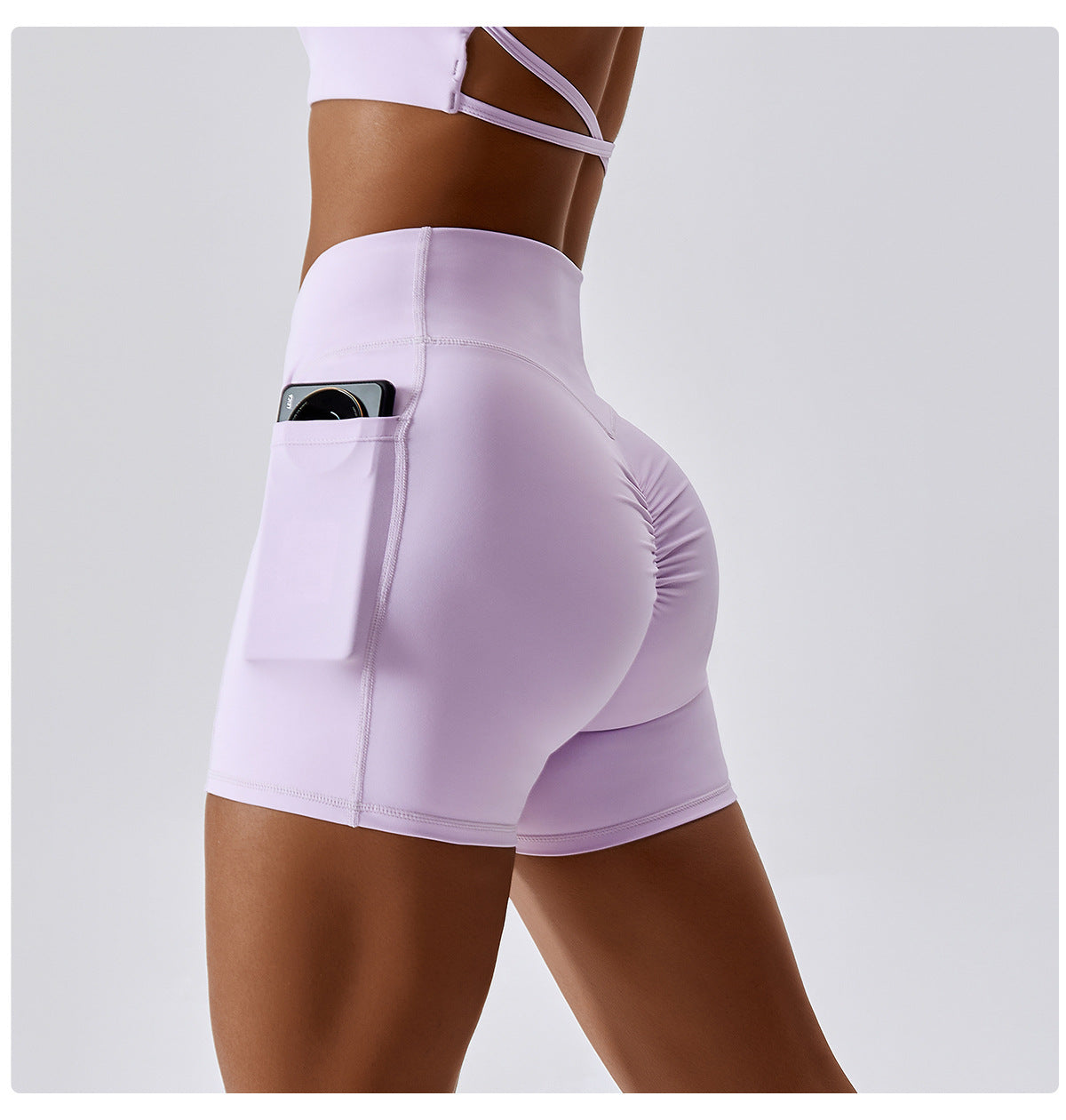 Solid color crossover waist pocket sports shorts