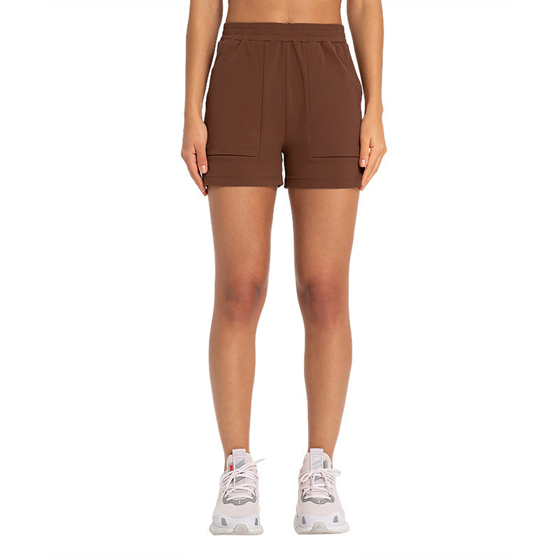 Side pockets stretch loose sports shorts