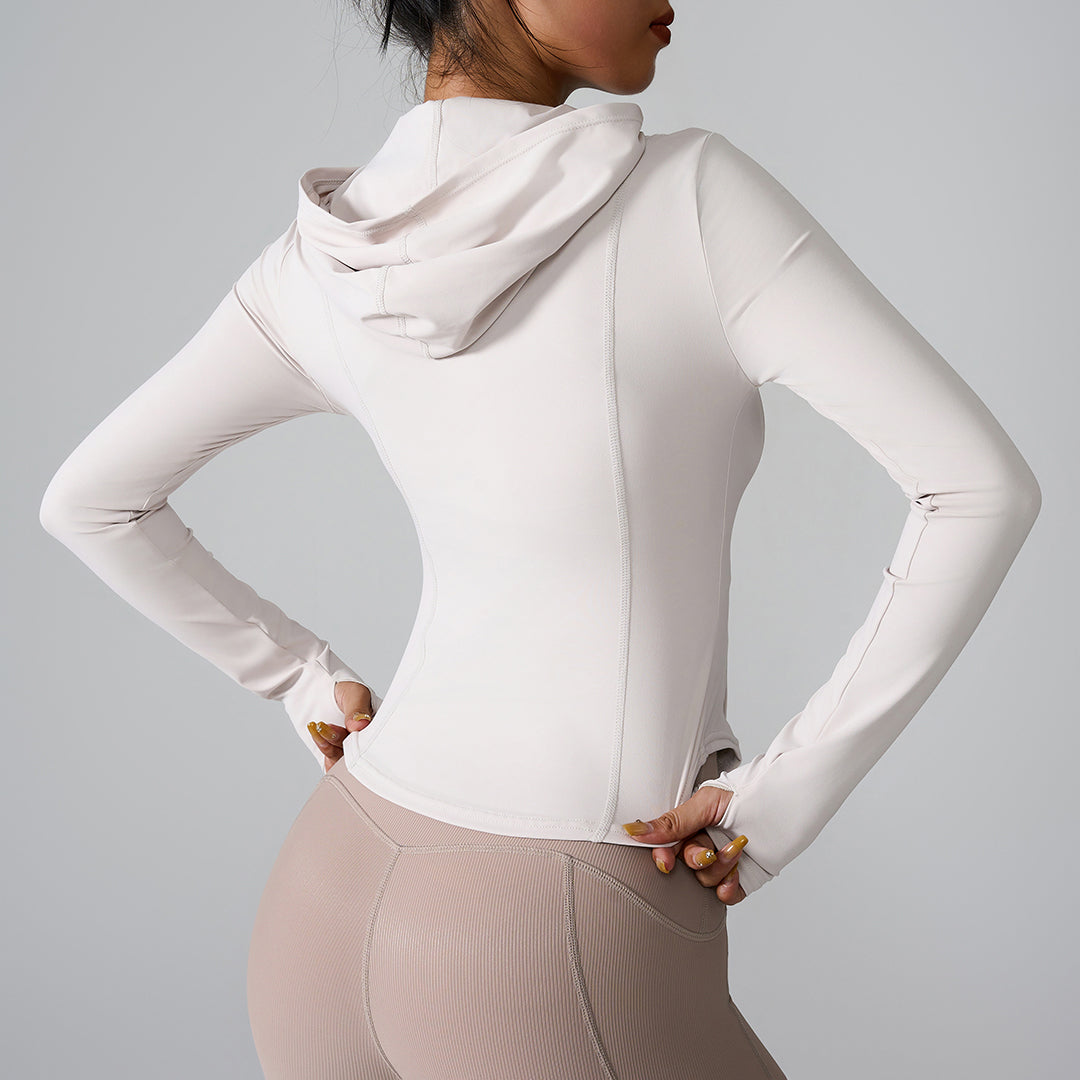 Long sleeved zippered hooded sports top