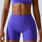 Solid color high-waisted sports shorts