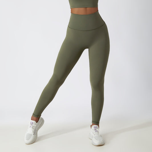 Legging de couleur unie à séchage rapide avec coutures sur les fesses