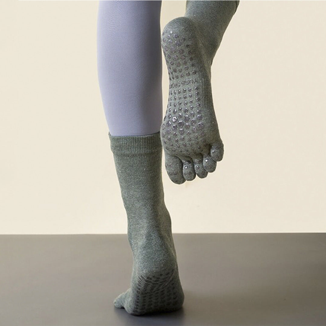 Chaussettes antidérapantes de yoga de sports de Pilates de mi-mollet