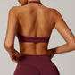 Seamless halter and backless sports bra