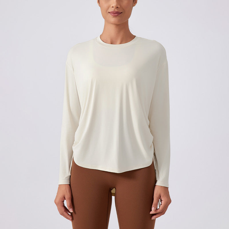 Nude and breathable long sleeve loose sports top