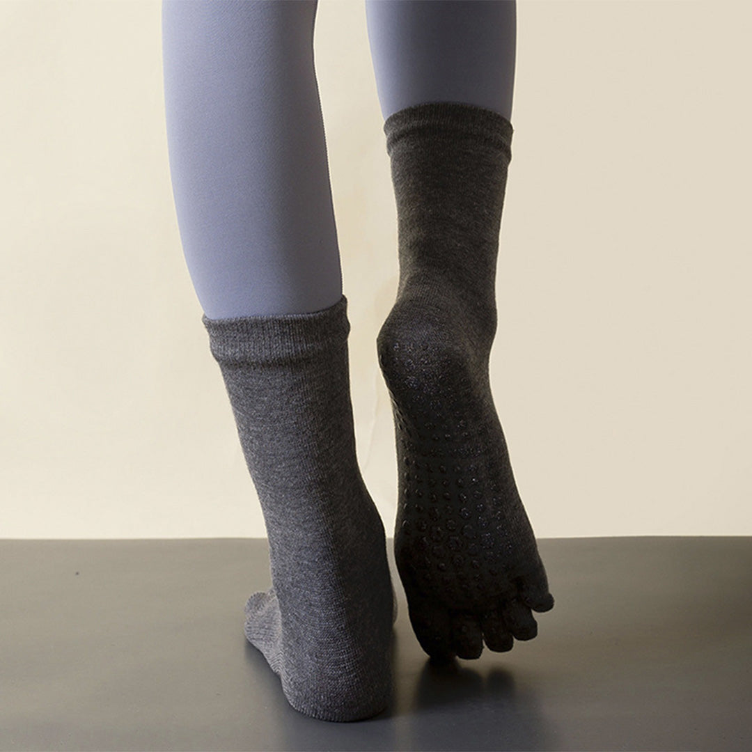 Chaussettes antidérapantes de yoga de sports de Pilates de mi-mollet