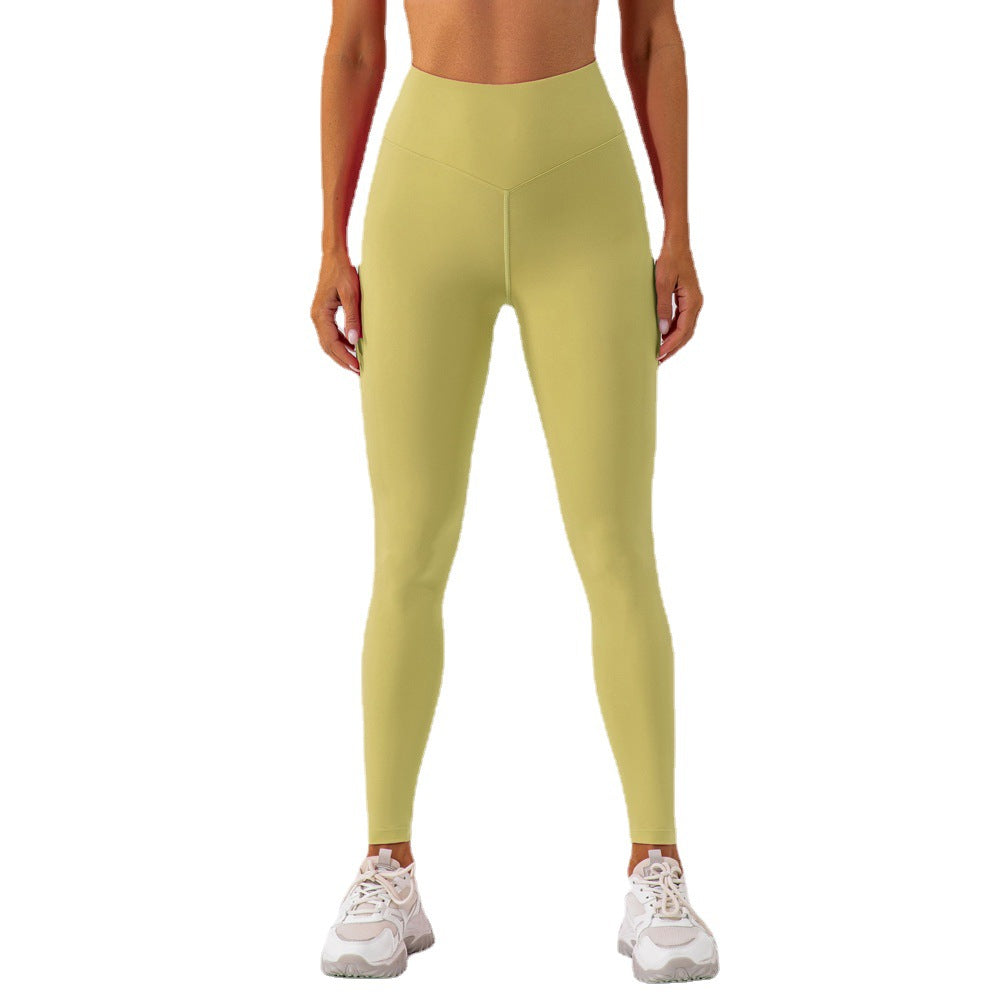 Legging de sport extensible de couleur unie