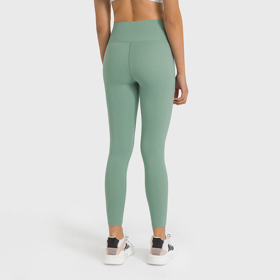 Legging de yoga extensible brossé de couleur unie